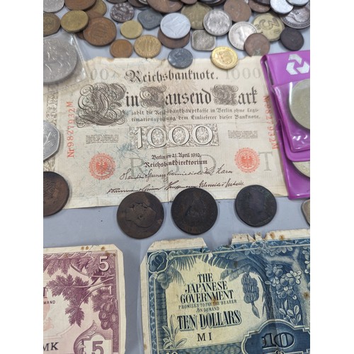 428 - Mixed coins from around the world to include Victorian and later pennies, coinage of Middle East, Eu... 