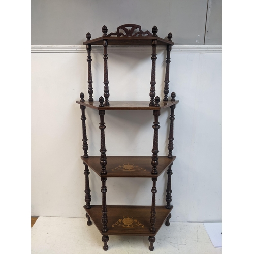 424 - A Victorian inlaid walnut four tier what-not with spiral turned columns
Location:G