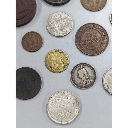 429 - A mixed group of coins of interest to include 1933 Palestine 10 mils, 1887 Victoria Jubilee Year Shi... 