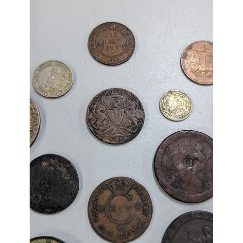 429 - A mixed group of coins of interest to include 1933 Palestine 10 mils, 1887 Victoria Jubilee Year Shi... 