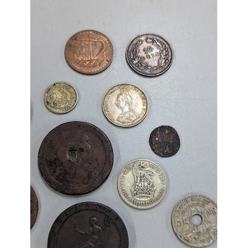 429 - A mixed group of coins of interest to include 1933 Palestine 10 mils, 1887 Victoria Jubilee Year Shi... 