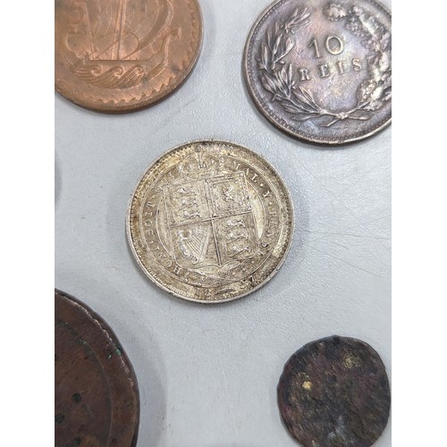 429 - A mixed group of coins of interest to include 1933 Palestine 10 mils, 1887 Victoria Jubilee Year Shi... 