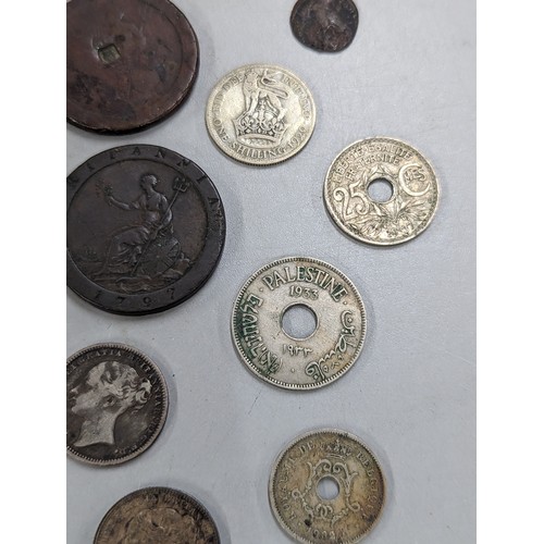 429 - A mixed group of coins of interest to include 1933 Palestine 10 mils, 1887 Victoria Jubilee Year Shi... 