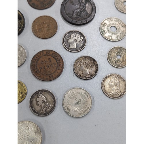 429 - A mixed group of coins of interest to include 1933 Palestine 10 mils, 1887 Victoria Jubilee Year Shi... 