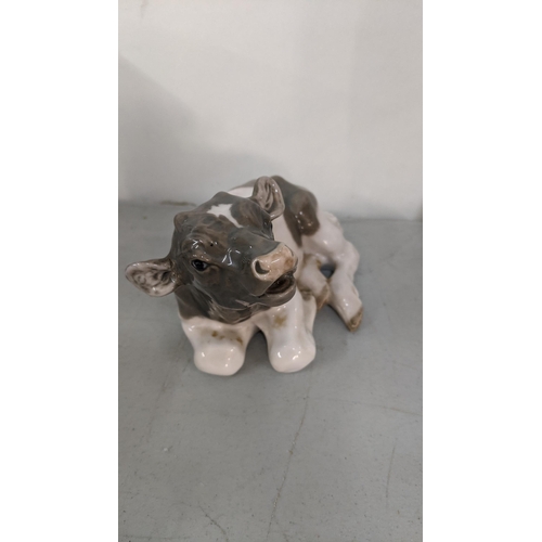 475 - THIS LOT HAS BEEN WITHDRAWN**
A mixed lot to include Royal Copenhagen porcelain resting cow 1072, a ... 