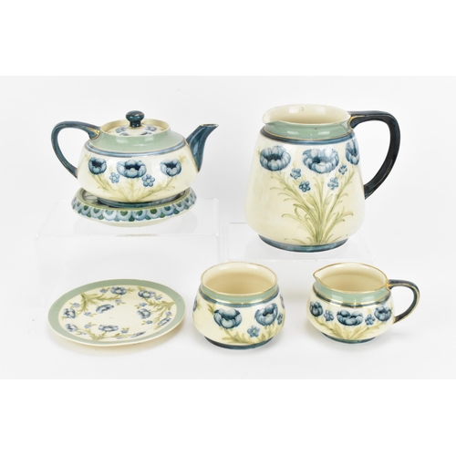 498 - A William Moorcroft (1872-1945) for James Macintyre & Co 'Blue Poppy' pattern part tea set, circa 19... 