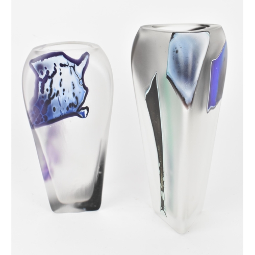 502 - Anthony Wassell (contemporary) British 
two triangular shaped glass vases of tapered form with styli... 