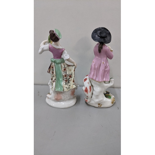 426 - A mixed lot to include two 19th century continental Chelsea style porcelain figures to include one o... 