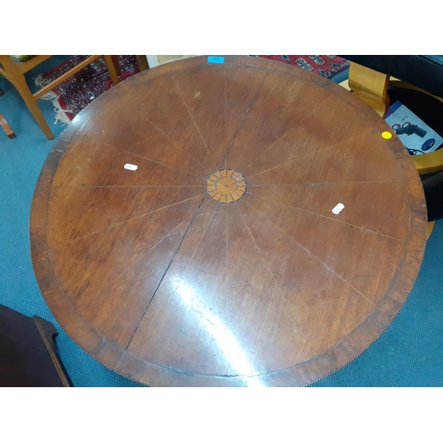 432 - An early 20th century circular cross banded table
Location: RAF