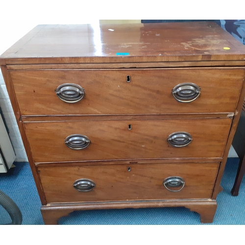 434 - A Georgian chest of three long drawers on bracket feet
Location: RWF