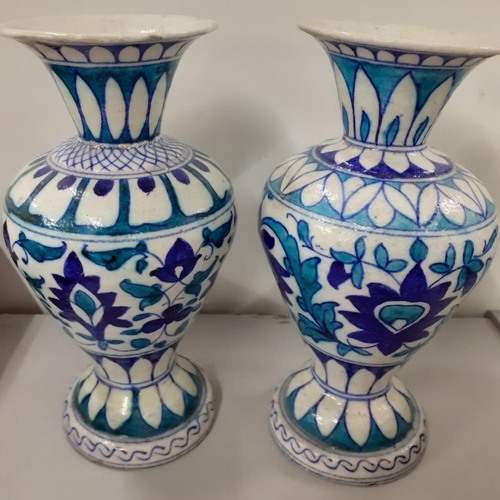 446 - A pair of late 19th century/early 20th century Islamic vases decorated in blue and green Location: A... 