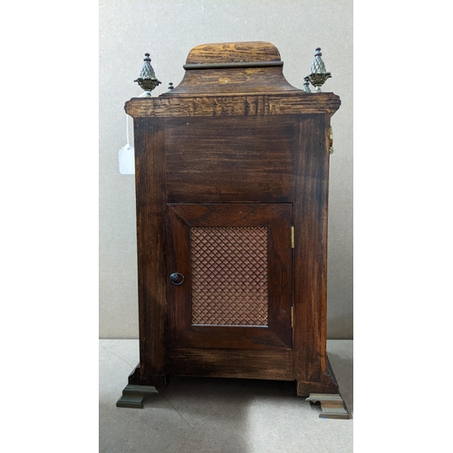 448 - A mid 20th century 8-day oak cased bracket clock having moon phase, strike selection lever for Westm... 