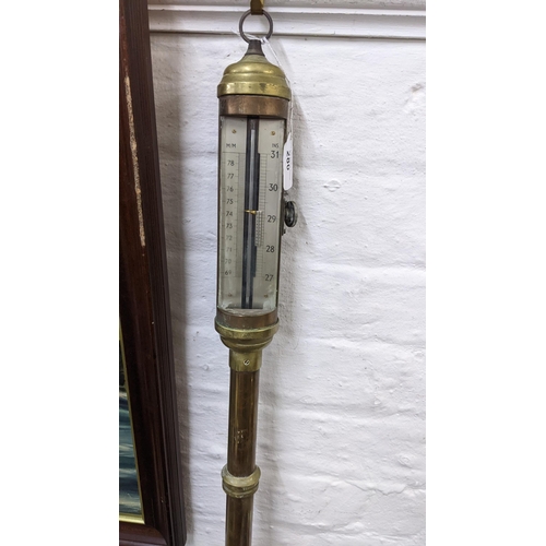 451 - An early/mid 20th century cylindrical brass marine ship's barometer Location:RWM