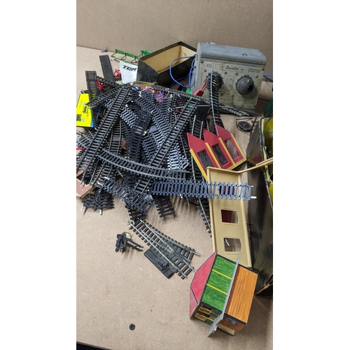 484 - A mixed lot of toys to include a Hornby 0 gauge LNER 623 locomotive, Triang Scalextric and mixed acc... 