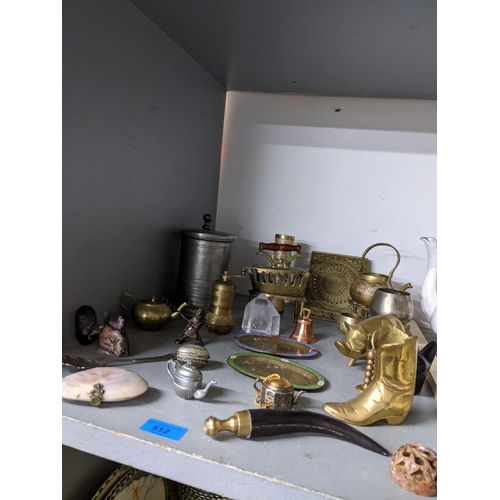 512 - A mixed lot of brassware and pewter and other items to include a Victorian plated thimble holder, an... 