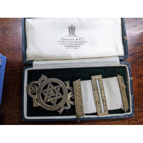 513 - A silver gilt Masonic Royal Arch jewel on a white ribbon stamped 'Kenning & Son, London Silver' in a... 