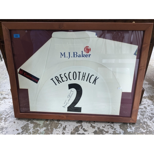 456 - A vintage signed TRESCOTHICK cricket shirt, mounted in glazed frame, 65.5cm x 88.5cm Location:G