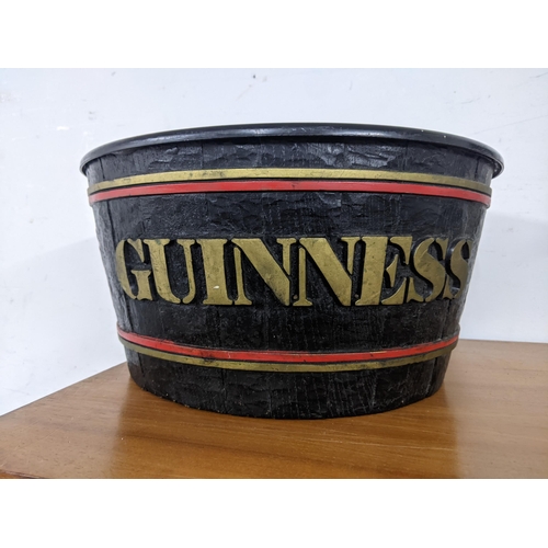 308 - Guinness - a composition advertising ice bucket fashioned as a barrel 36cm dia. Location: G