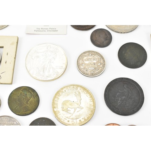 62 - Coins of Interest - A mixed collection to include a 1997 1oz fine silver USA Dollar, 1927 Parliament... 