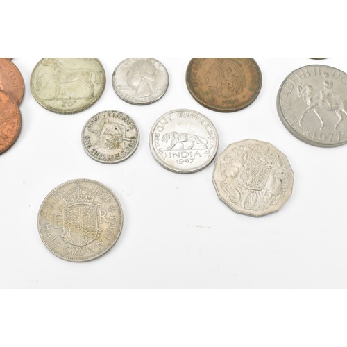 62 - Coins of Interest - A mixed collection to include a 1997 1oz fine silver USA Dollar, 1927 Parliament... 