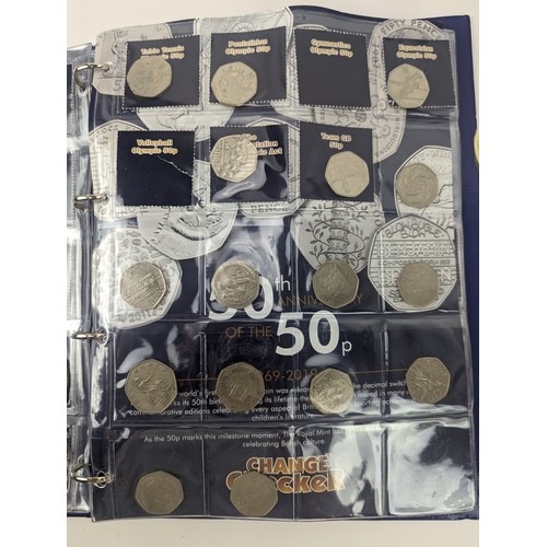 86 - A mixed group of UK and other world proof and other coinage to include a change checker album of £2 ... 