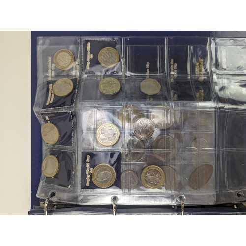 86 - A mixed group of UK and other world proof and other coinage to include a change checker album of £2 ... 