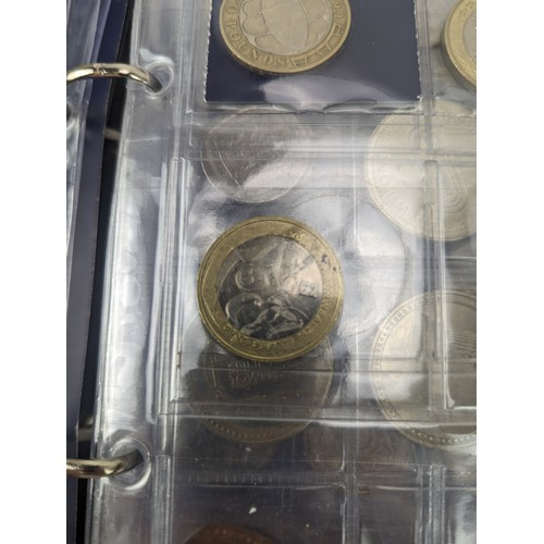 86 - A mixed group of UK and other world proof and other coinage to include a change checker album of £2 ... 