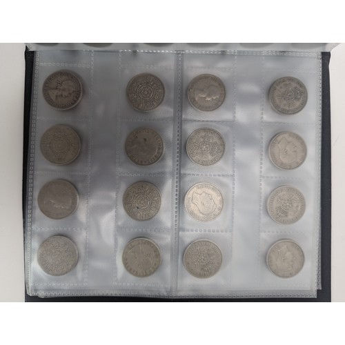 86 - A mixed group of UK and other world proof and other coinage to include a change checker album of £2 ... 