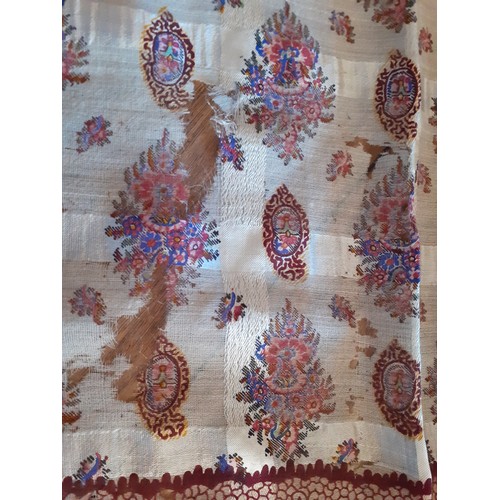 96 - A mid 19th Century Victorian wool gazar crinoline shawl A/F having a wide border in crimson and blue... 