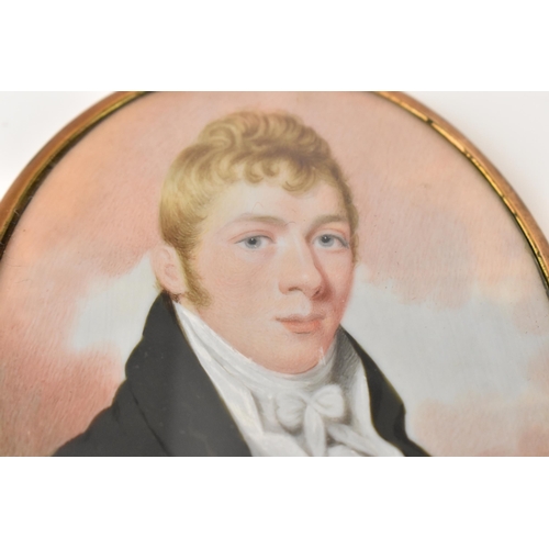 162 - A 19th century portrait miniature on ivory of a gentleman, wearing a white frill cravate and black j... 