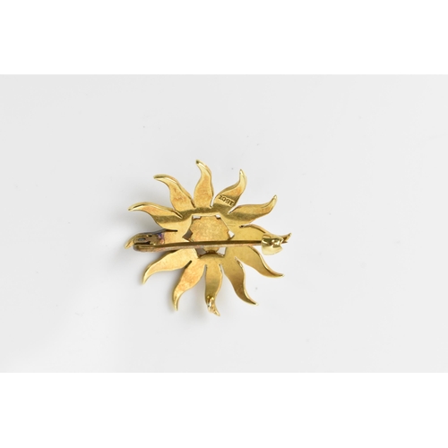 183 - An Edwardian 15ct yellow gold and split seed pearl starburst brooch, 3 cm diameter, 4.9 grams