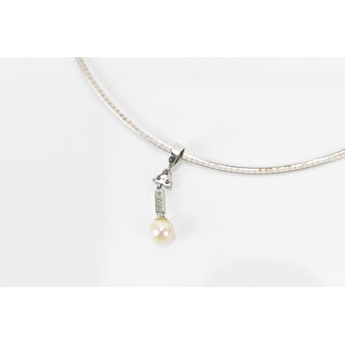 184 - An 18ct white gold, diamond and pearl necklace, the pendant set with three brilliant cut diamonds ab... 