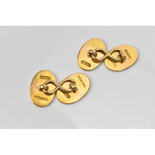 186 - A pair of Victorian 15ct yellow gold cufflinks, of oval form with engraved monogram, fully hallmarke... 