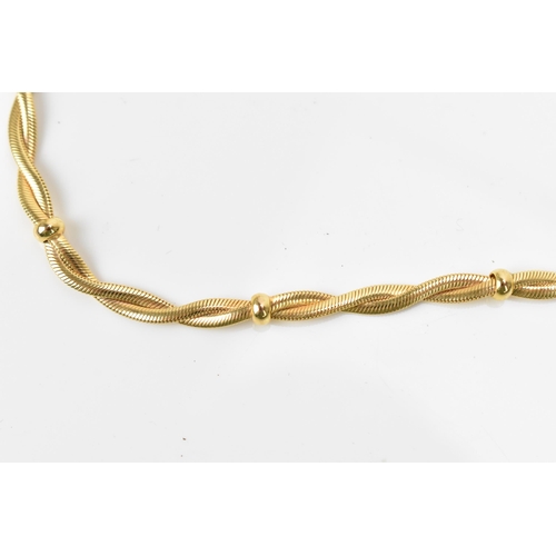 188 - An Italian 9ct yellow gold necklace with intertwined snake chain and spaced gold rings, 42 cm long, ... 