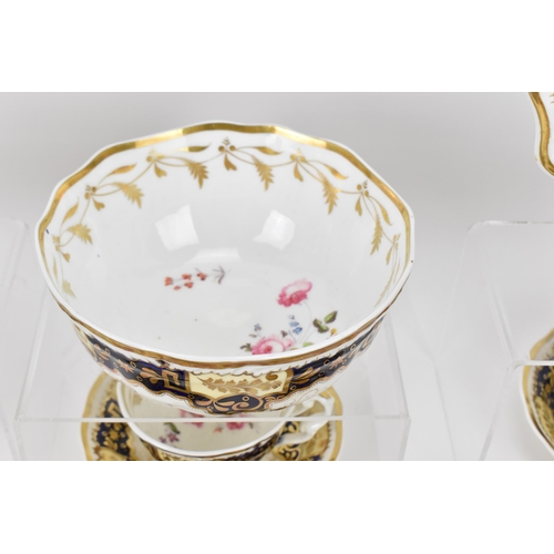 197 - An early 19th century painted porcelain part tea set by John Yates, circa 1820-30, comprising twelve... 