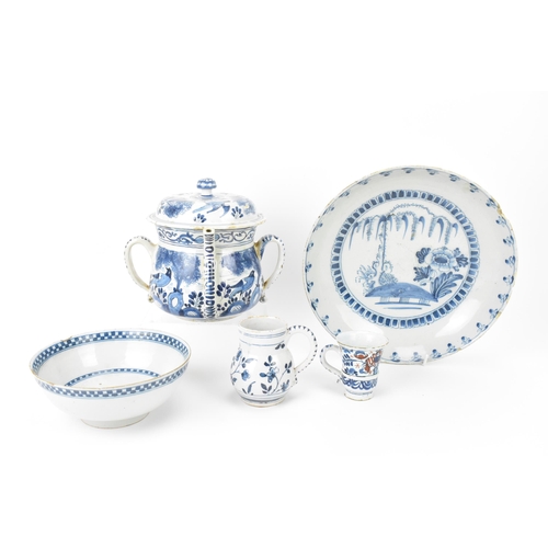 199 - An 18th century British blue and white delft posset pot and cover, London or Bristol, together with ... 