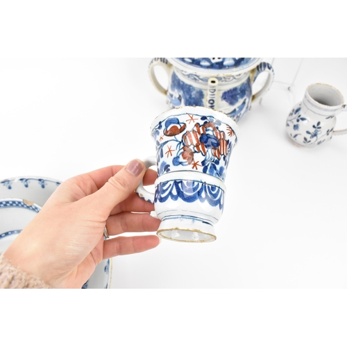 199 - An 18th century British blue and white delft posset pot and cover, London or Bristol, together with ... 