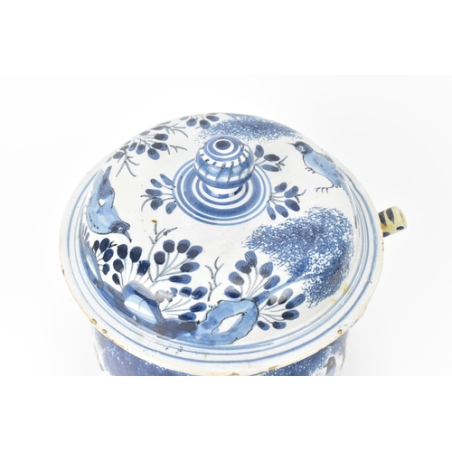 199 - An 18th century British blue and white delft posset pot and cover, London or Bristol, together with ... 