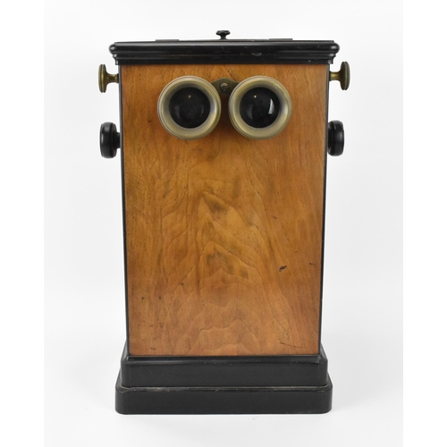 212 - A Victorian walnut and ebonised wood table-top stereoscope viewer, with cranking mechanism, with adj... 