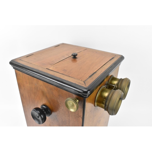 212 - A Victorian walnut and ebonised wood table-top stereoscope viewer, with cranking mechanism, with adj... 