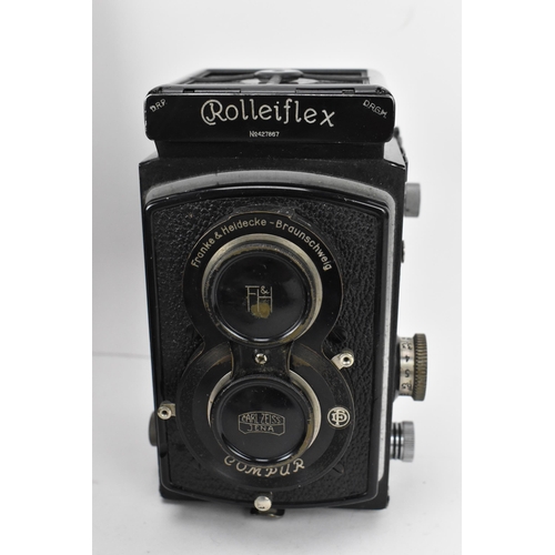 215 - THIS LOT HAS BEEN WITHDRAWN

A 1930s Rolleiflex Compur box Camera, serial no 427867, Compur shutter,... 