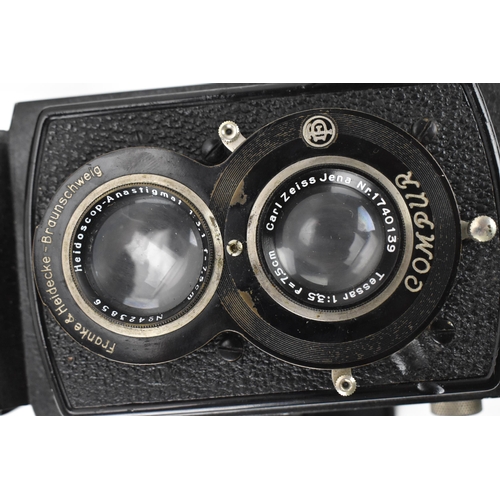 215 - THIS LOT HAS BEEN WITHDRAWN

A 1930s Rolleiflex Compur box Camera, serial no 427867, Compur shutter,... 