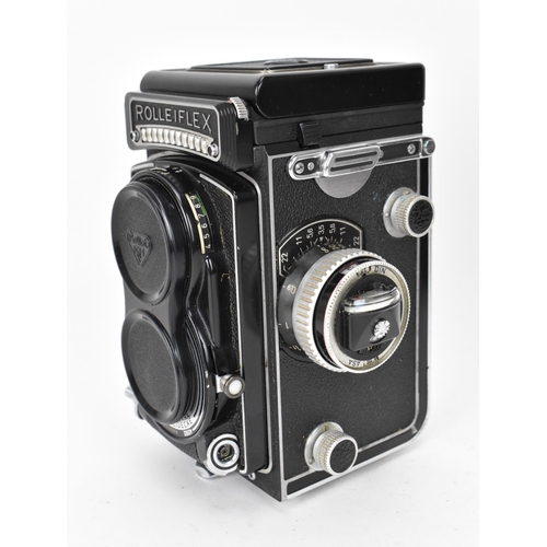 220 - A Rolleiflex T 3.5 TLR camera , with Carl Zeiss nr. 2818876 Tessar 1:3,5/f=75mm taking lens, and Hei... 