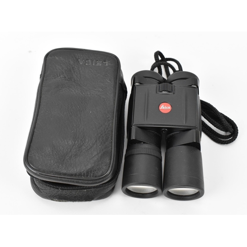 226 - A pair of Leica Trinovid 10x25 binoculars, in leather carry case