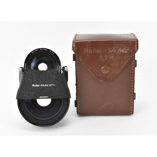 228 - A Rollei-Mutar 0.7x lens set, 3844200, with brown leather case