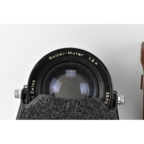 229 - A Rollei-Mutar 1.5x lens set, 3570405, with brown leather case