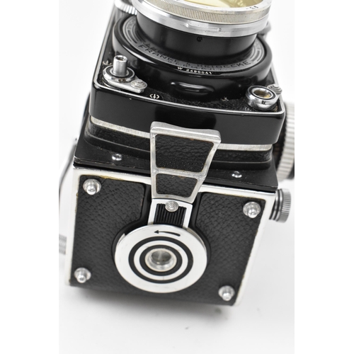 233 - A Rolleiflex Synchro-Compur wide angle TLR camera, in black, 2490041, with Carl Zeiss Distagon 1:4 f... 