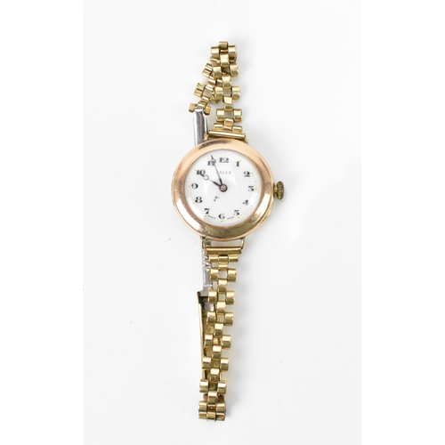7 - An early 20th century Rolex, manual wind, ladies, 9ct gold wristwatch, having a white dial with Roma... 