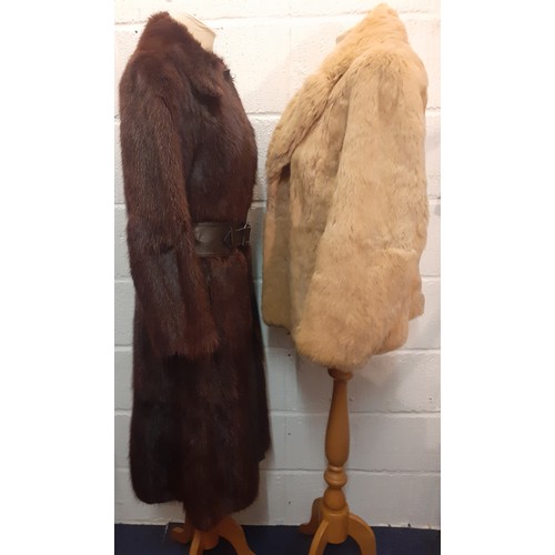 129 - A 1960's/70's French brown mink coat, 36