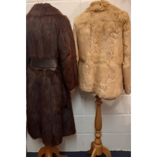 129 - A 1960's/70's French brown mink coat, 36